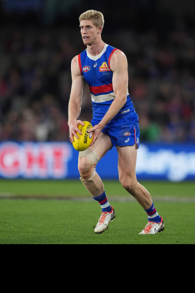 Tim English was well beaten at stoppages 24 to 42 last week by former teammate Jordon Sweet, but the Bulldogs ended up edging Port Adelaide for stoppages despite getting belted on the scoreboard and English contributed two goals from his 17 disposals, eight marks and five tackles. This is a common set of numbers for the Bulldogs who tend to wilt against good teams, and it raises the question of whether English merits All-Australian status... or are his talents wasted? Perhaps it's an indictment on his team's attack that they rely on him to drift forward to score. His owners don't care.